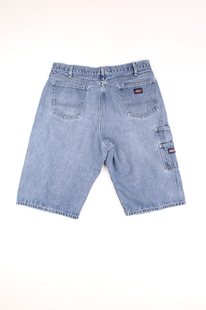 Dickies Carpenter Shorts in a blue denim colourway, multiple pockets and has the logo embroidered on the back. 