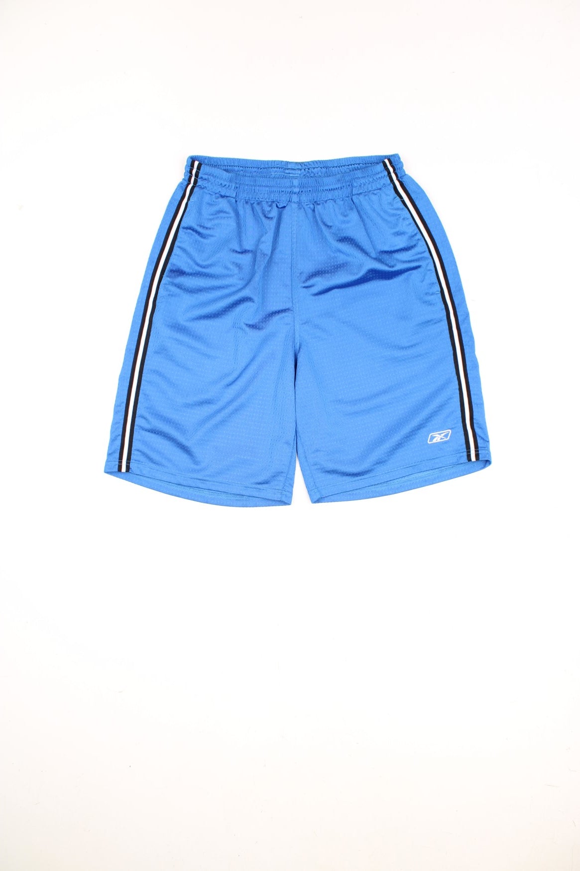 Reebok Basketball Shorts in a blue colourway with black and white stripes going down the sides, has an elasticated waist, side pockets, and the logo embroidered on the front. 