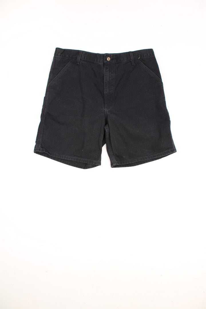 Carhartt Carpenter Shorts in a black colourway, multiple pockets, and has the logo embroidered on the back. 