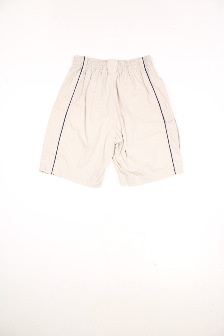 Nike Cargo Shorts in a tanned colourway with a blue stripe going down either side, multiple pockets, and has the logo embroidered on the front. 