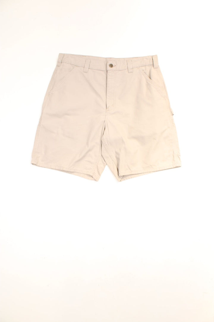 Carhartt Carpenter Shorts in a tanned colourway, has multiple pockets and the logo embroidered on the back. 