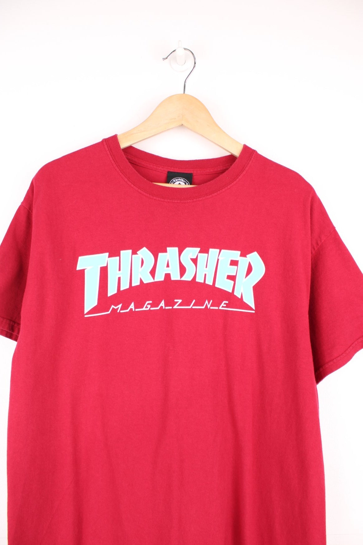 Vintage Thrasher Magazine red T-Shirt with classic blue spell out logo.