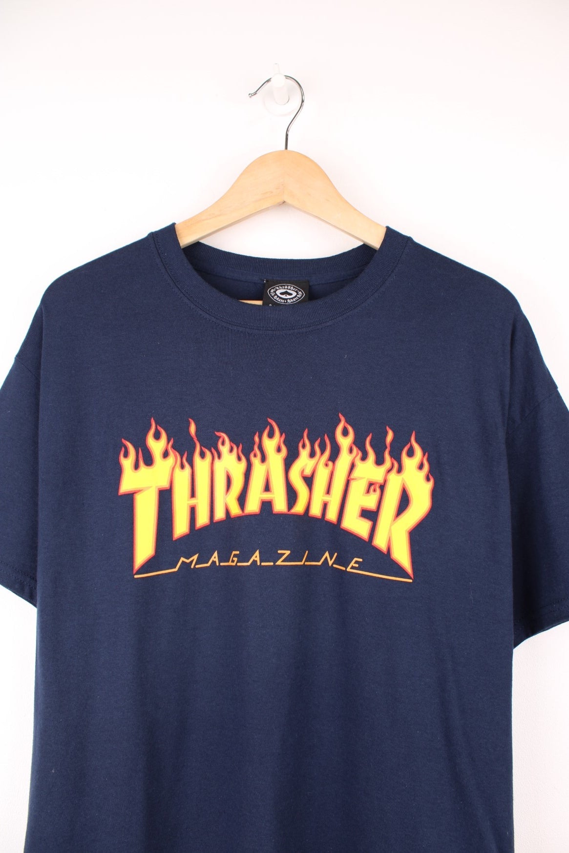 Vintage Thrasher Magazine classic spell out flame T-Shirt in navy blue.