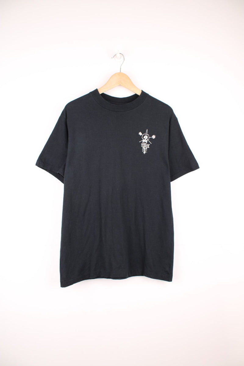 Vintage Stussy single stitch T-Shirt with embroidered skull graphic and printed logo on the chest.