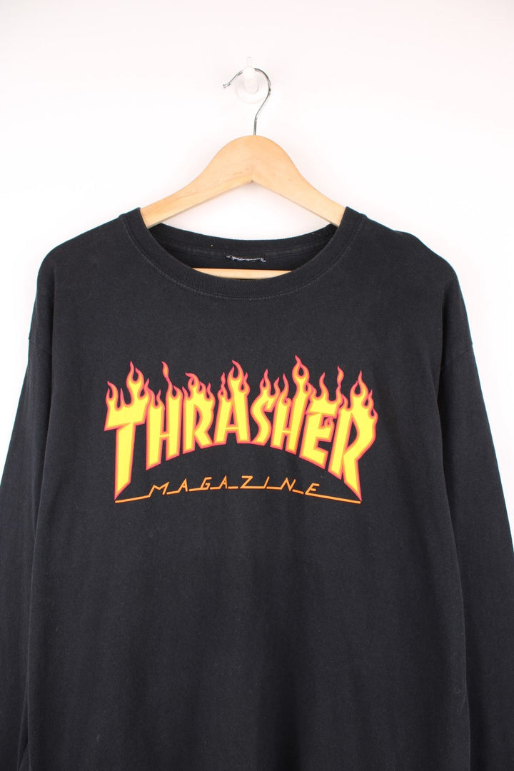 Vintage Thrasher Magazine classic spell out flame long sleeved T-Shirt in black.