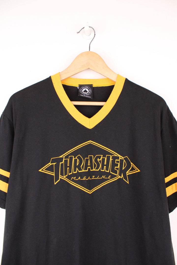 Thrasher Magazine Diamand spell out logo T-Shirt with yellow striped sleeves.