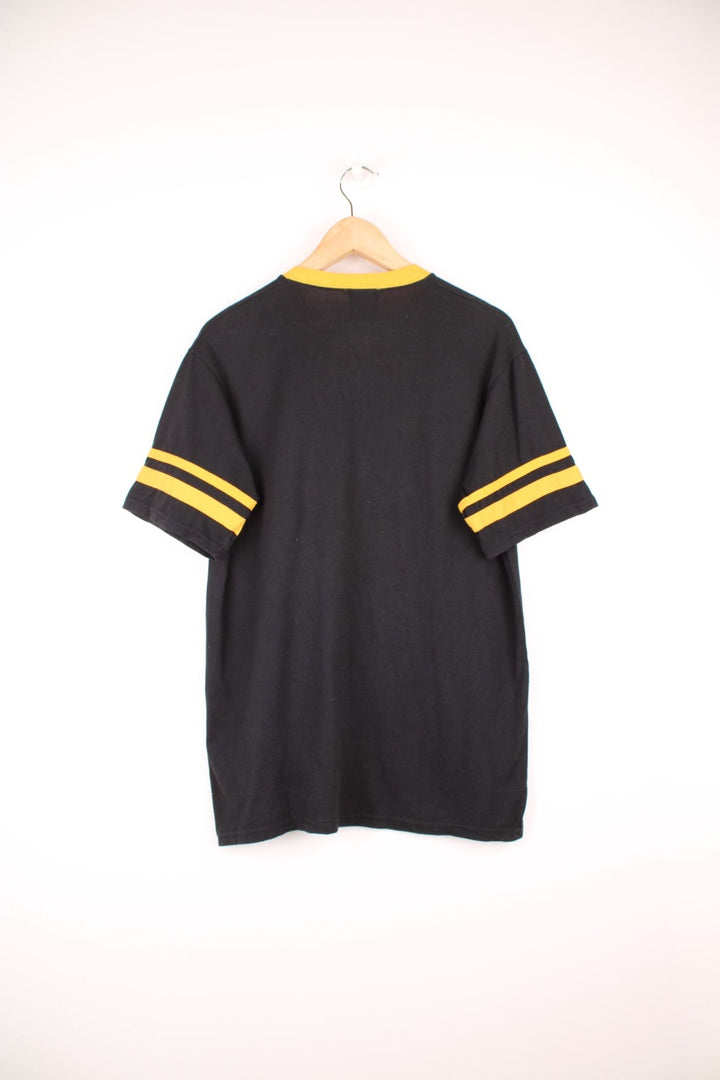 Thrasher Magazine Diamand spell out logo T-Shirt with yellow striped sleeves.