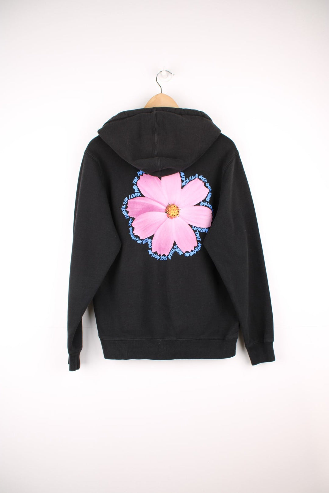 Stussy Cosmos Hoodie with graphic flower print on the chest and back bordered by poetic script.