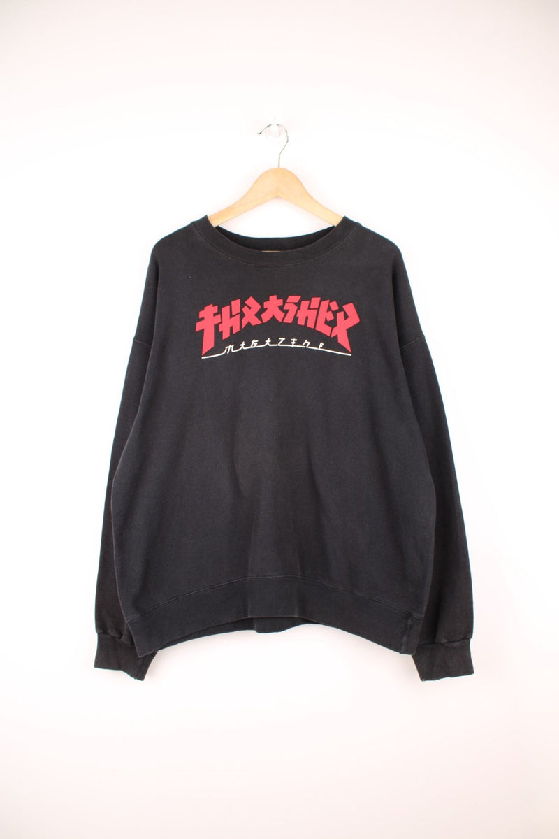 Thrasher Godzilla crew neck sweatshirt in black with signature printed logo across the chest in red.