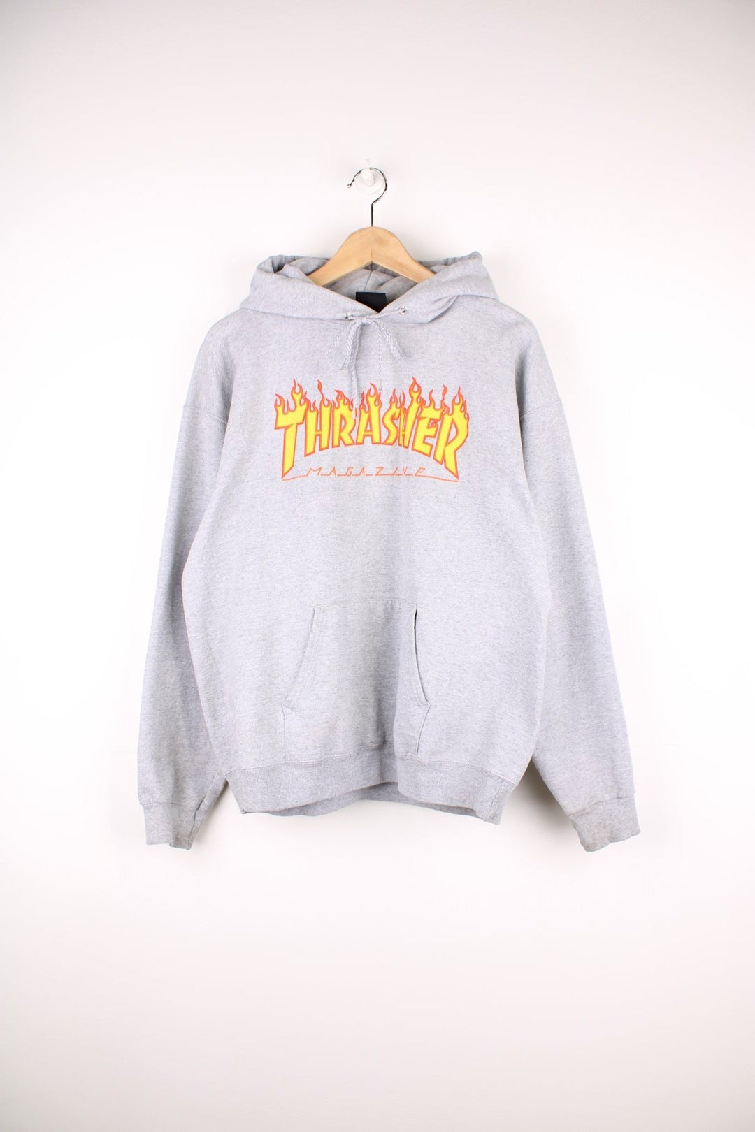 Thrasher all grey hoodie with signature flame graphic spell-out logo on the front