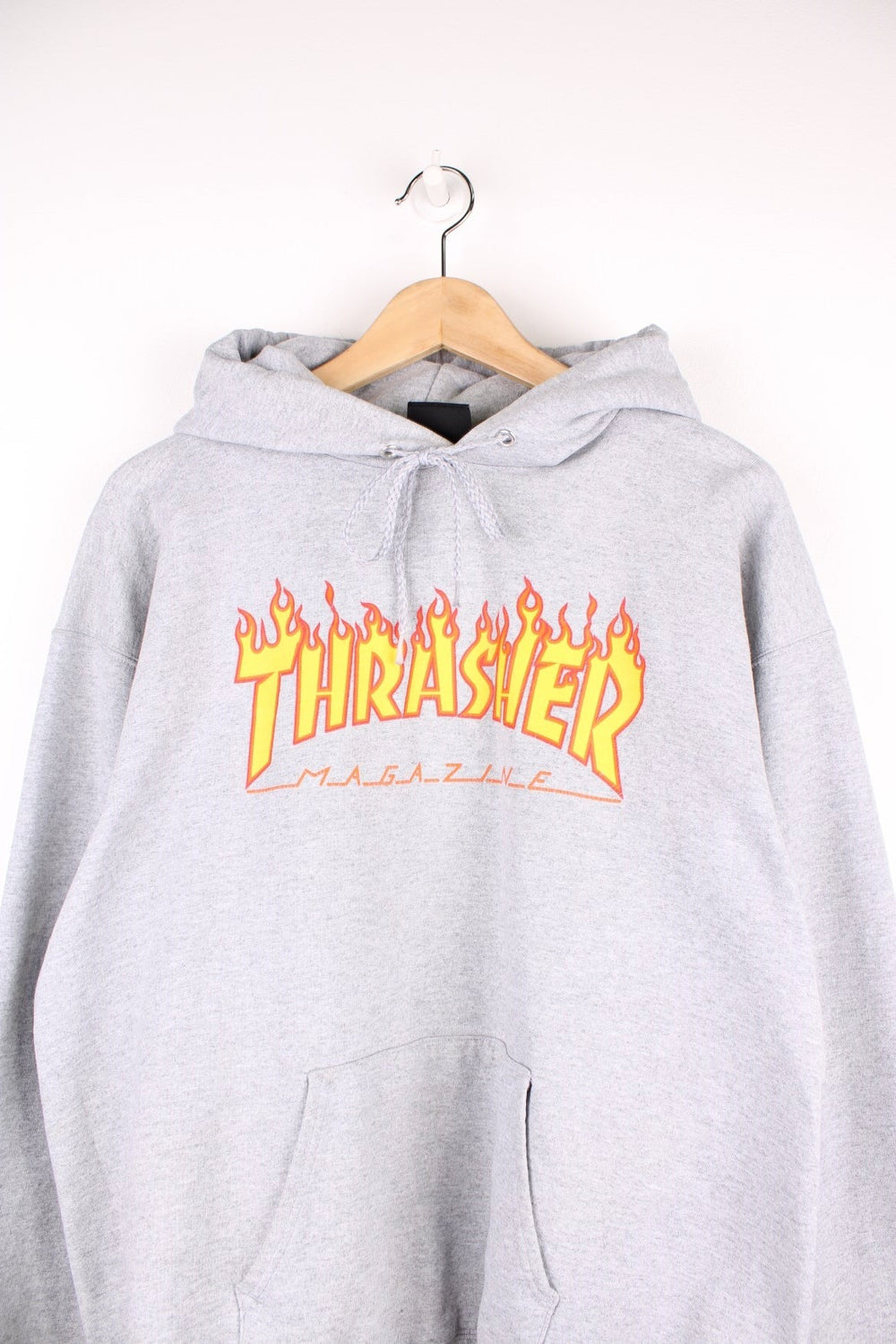 Thrasher all grey hoodie with signature flame graphic spell-out logo on the front