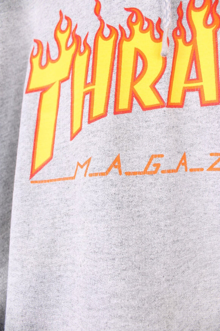 Thrasher all grey hoodie with signature flame graphic spell-out logo on the front