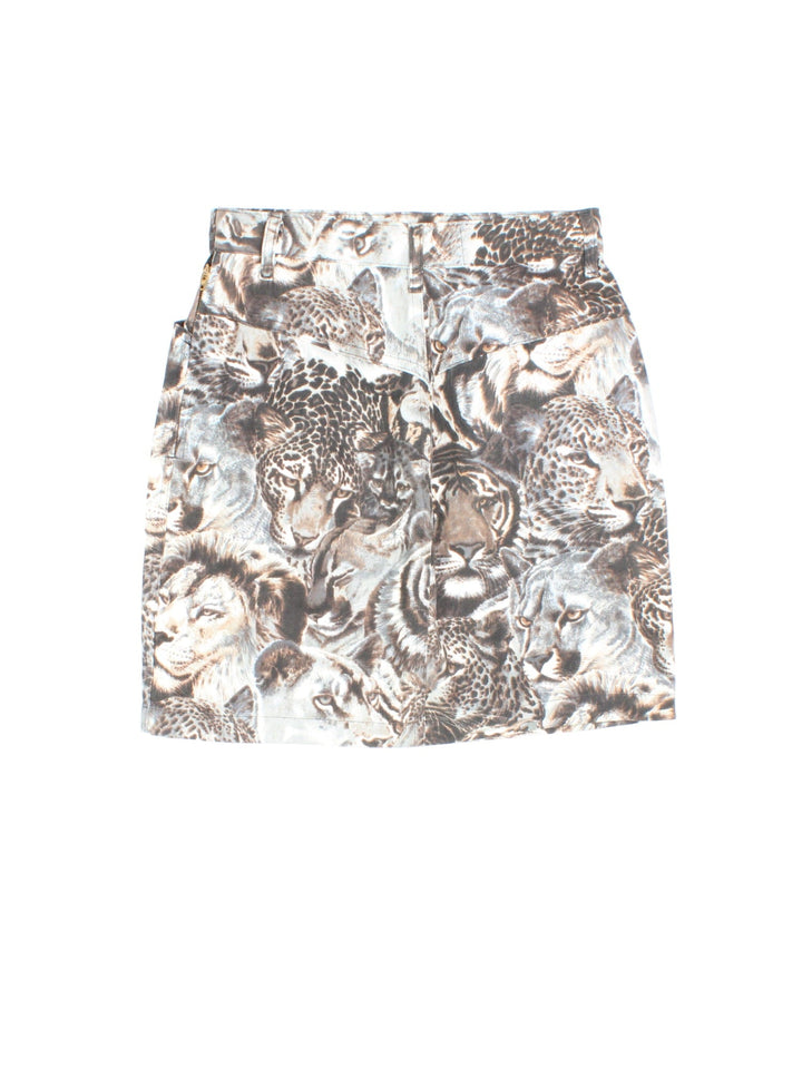 80s Kenzo big cat print denim mini skirt in grey with two pockets and zip and button closure.