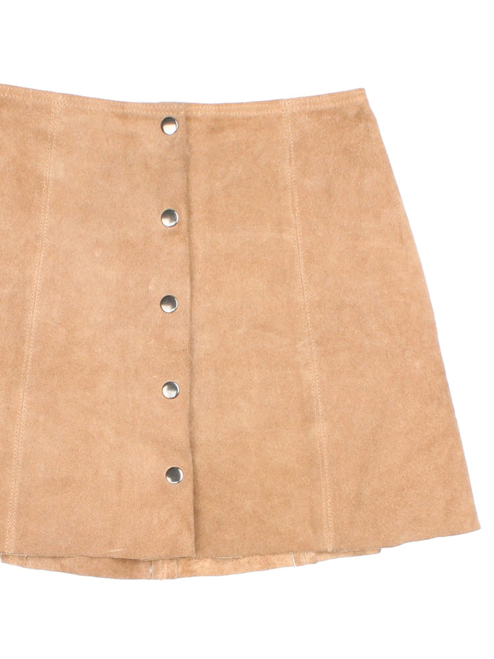 Y2K Topshop suede mini skirt in tan with snap closure.