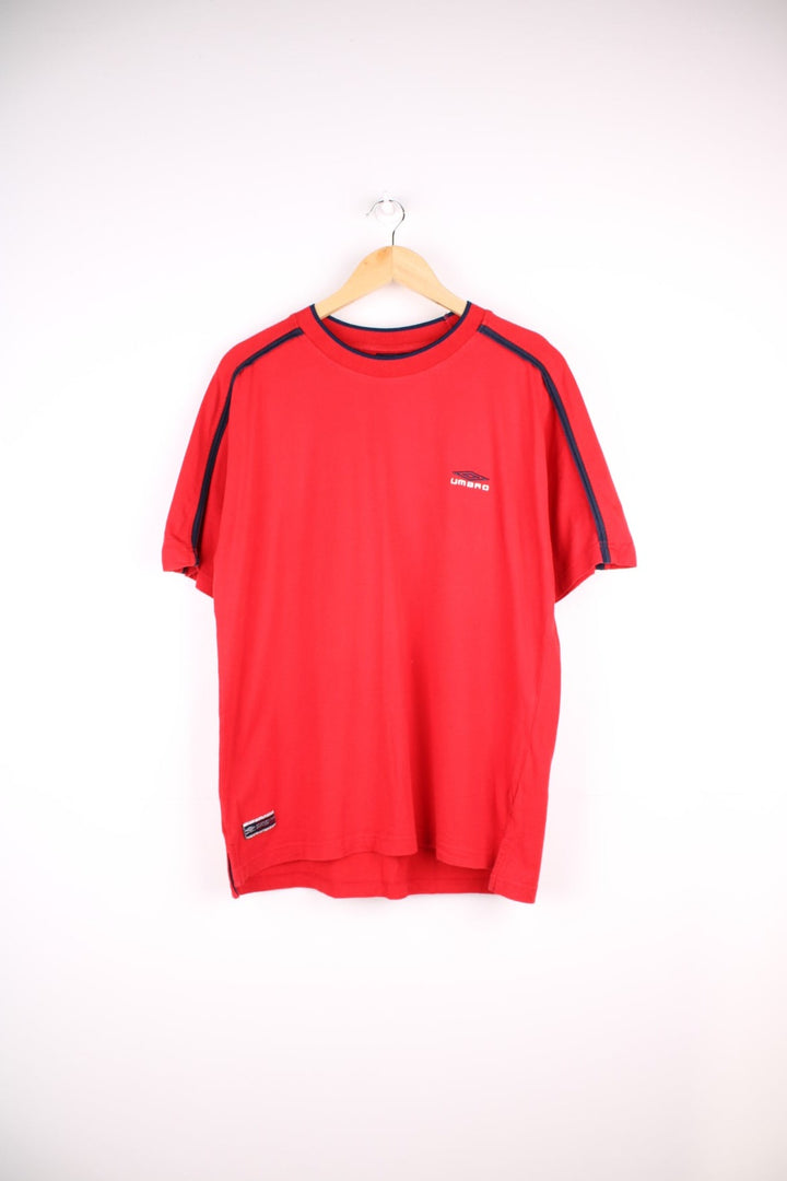 Vintage Umbro T-Shirt in a red colourway with an embroidered logo on the front