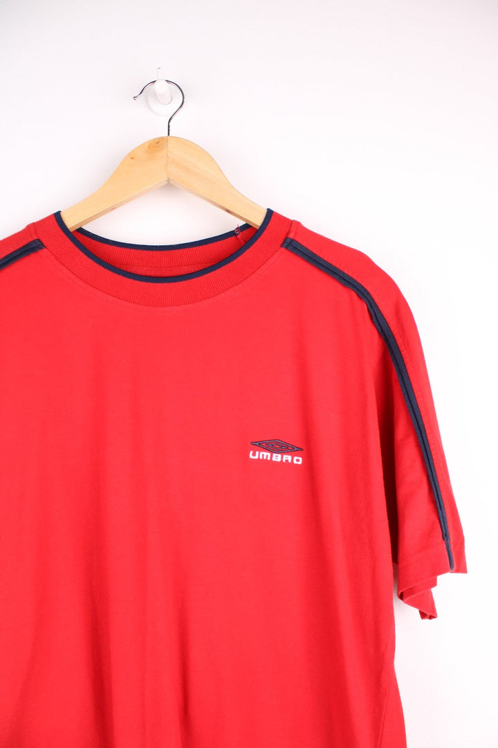 Vintage Umbro T-Shirt in a red colourway with an embroidered logo on the front