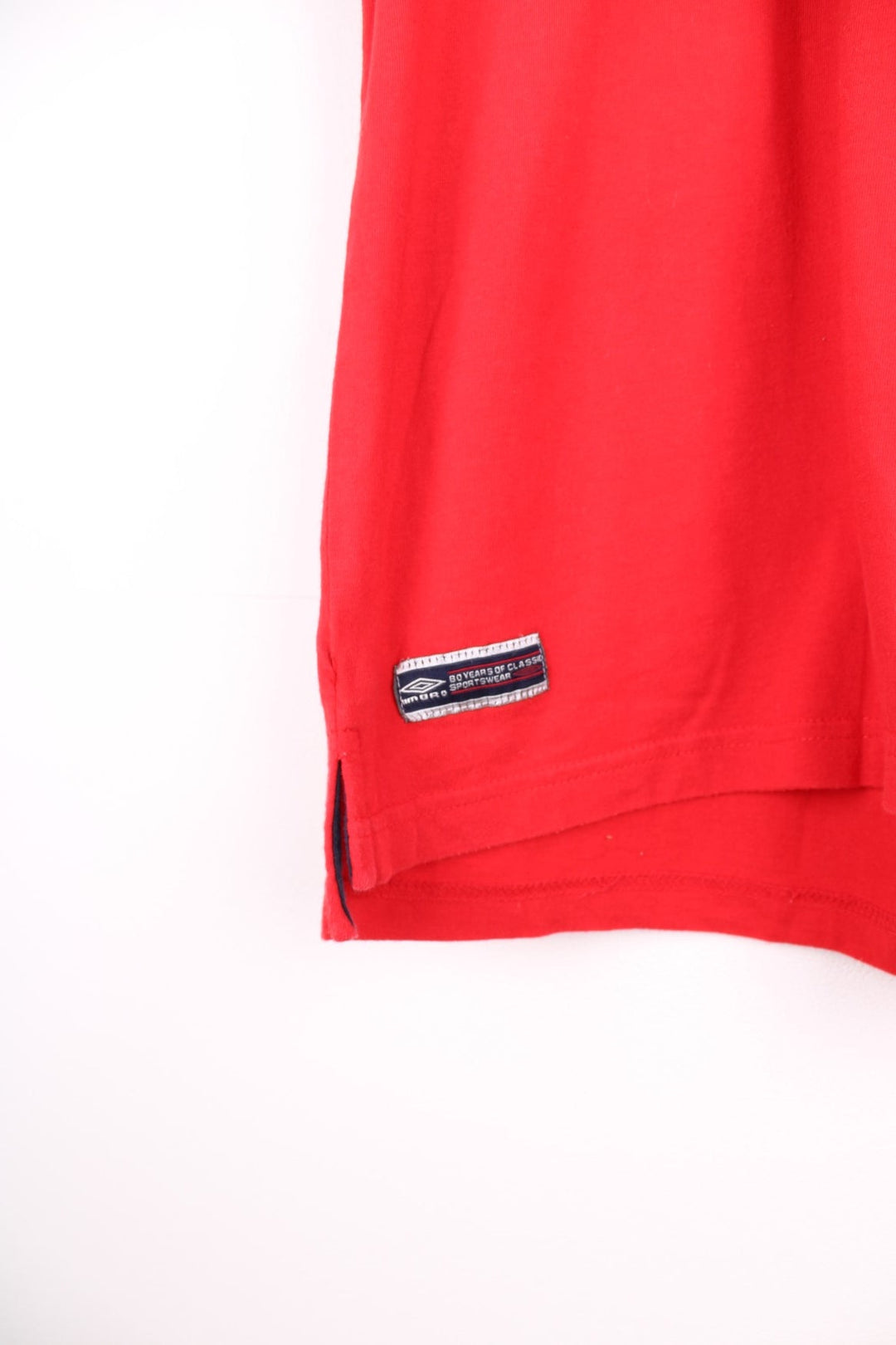 Vintage Umbro T-Shirt in a red colourway with an embroidered logo on the front