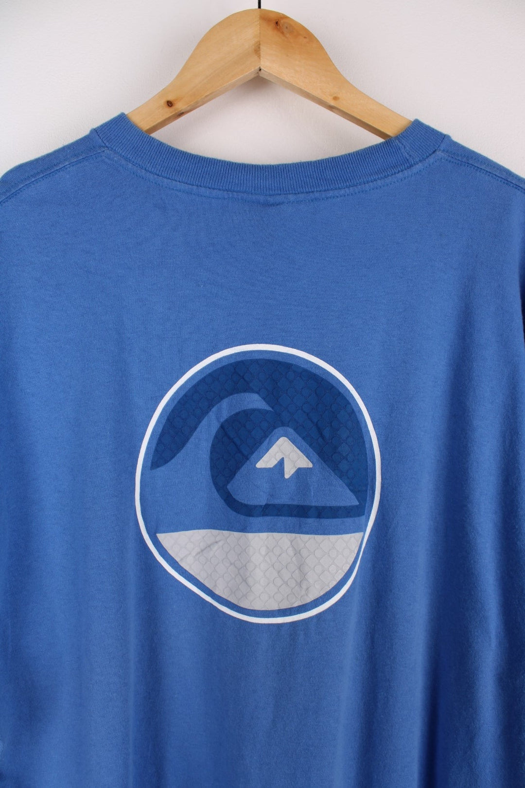 Single stitch Quiksilver T-Shirt in a blue colourway with a wave graphic printed on the front and larger on the back. 