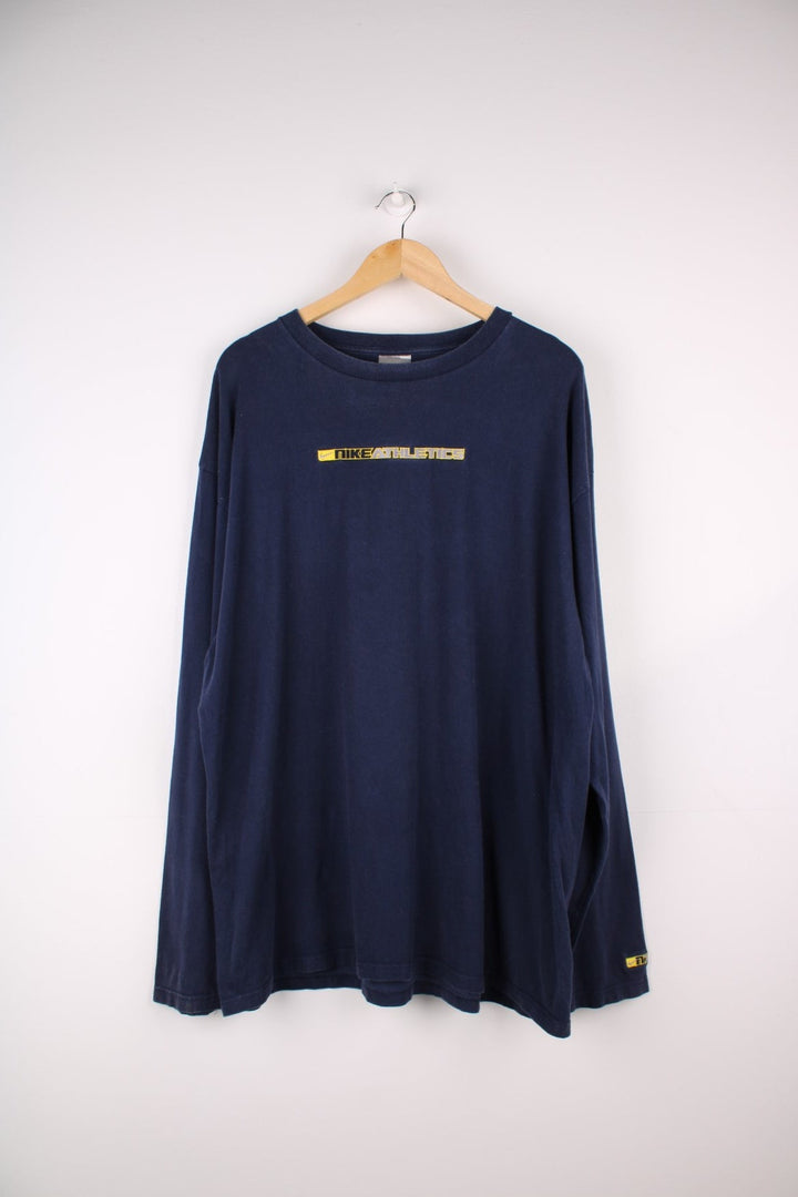 2000s Nike Athletics longsleeve T-Shirt in a navy blue colourway with the logo embroidered on the front.