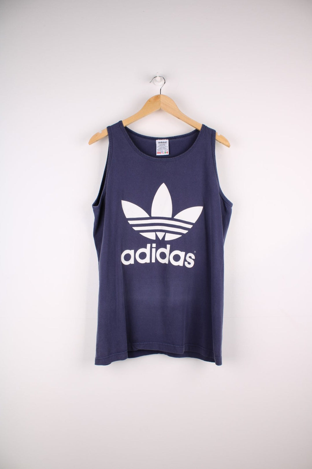 1990s Adidas vest top in a navy blue colourway with the logo screenprinted on the front and back.