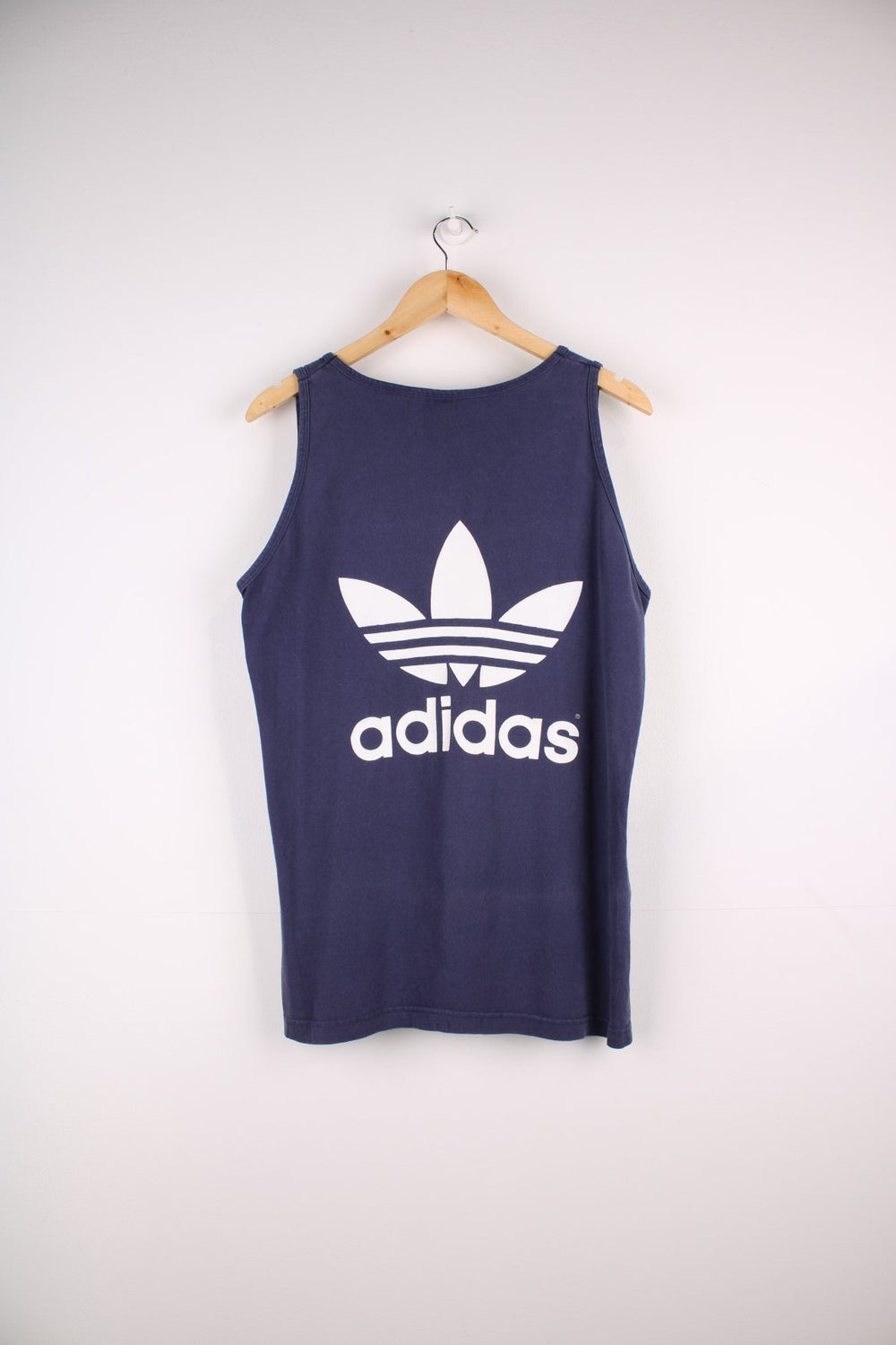 1990s Adidas vest top in a navy blue colourway with the logo screenprinted on the front and back.