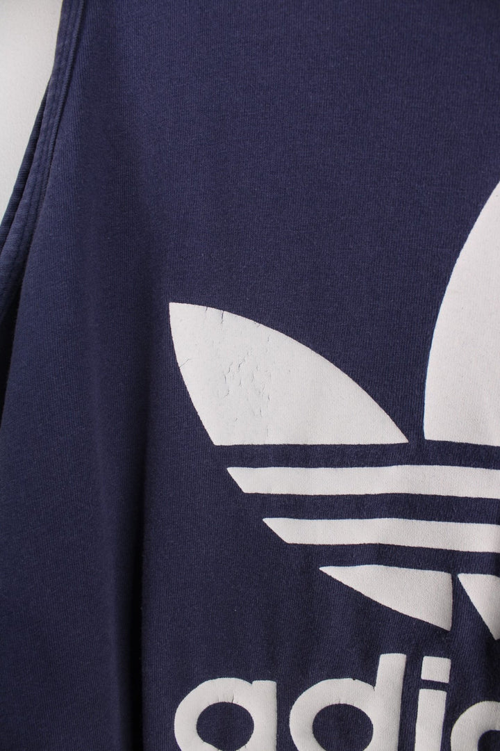 1990s Adidas vest top in a navy blue colourway with the logo screenprinted on the front and back.