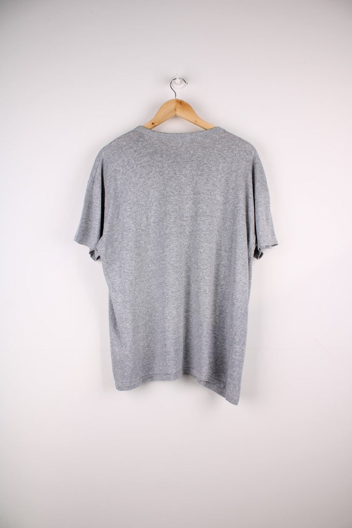 Vintage 1980s single stitch Champion T-Shirt in a grey colourway with Columbia printed on the front. 