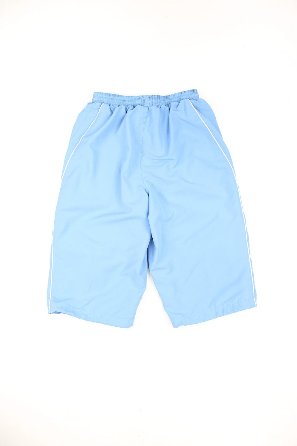 Blue Umbro 3/4 length/capri shorts. Features embroidered logo and toggle drawstring on each leg.