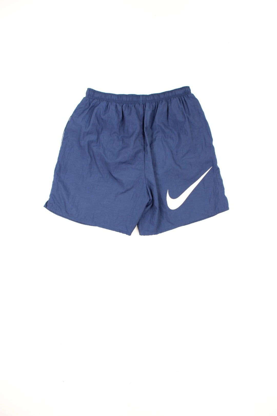 Vintage Nike shorts with elasticated drawstring waist, embroidered logo on the front and printed logo on the back.