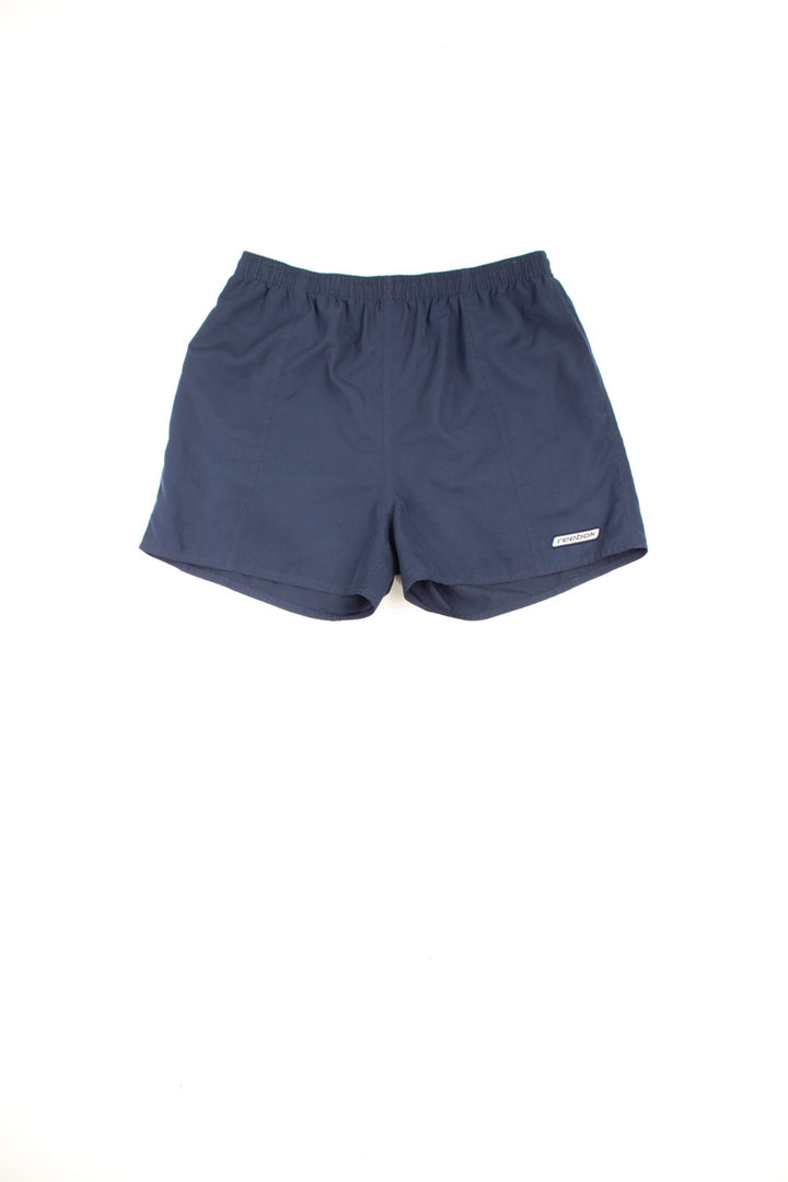 Reebok shorts with elasticated drawstring waist and embroidered logo.