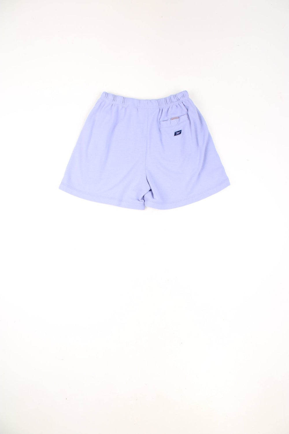 Purple Reebok shorts with elasticated drawstring waist and embroidered logo.