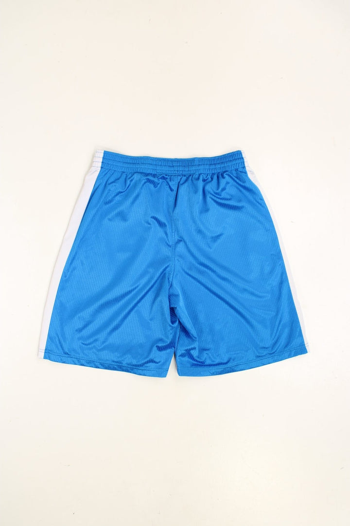 Nike Basketball Shorts in a blue and white colourway with stripes going down the sides, has an adjustable waist, side pockets, and has the swoosh logo embroidered on the front.