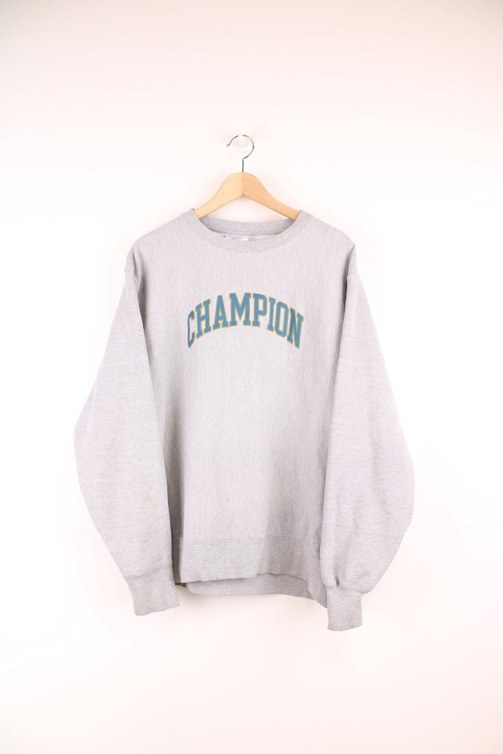 Champion Reverse Weave Sweatshirt in a grey colourway with the spell out logo embroidered across the front.