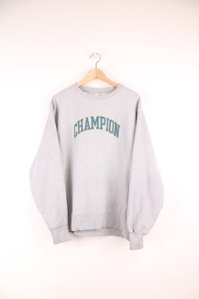 Champion Reverse Weave Sweatshirt in a grey colourway with the spell out logo embroidered across the front.