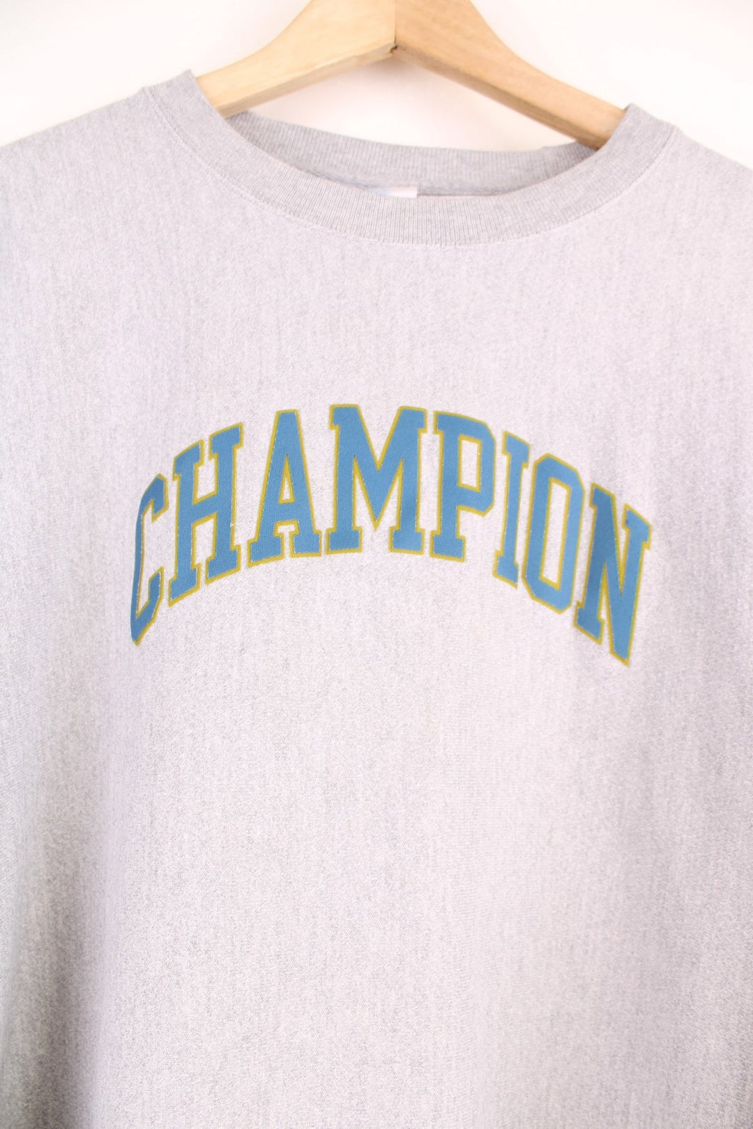 Champion Reverse Weave Sweatshirt in a grey colourway with the spell out logo embroidered across the front.