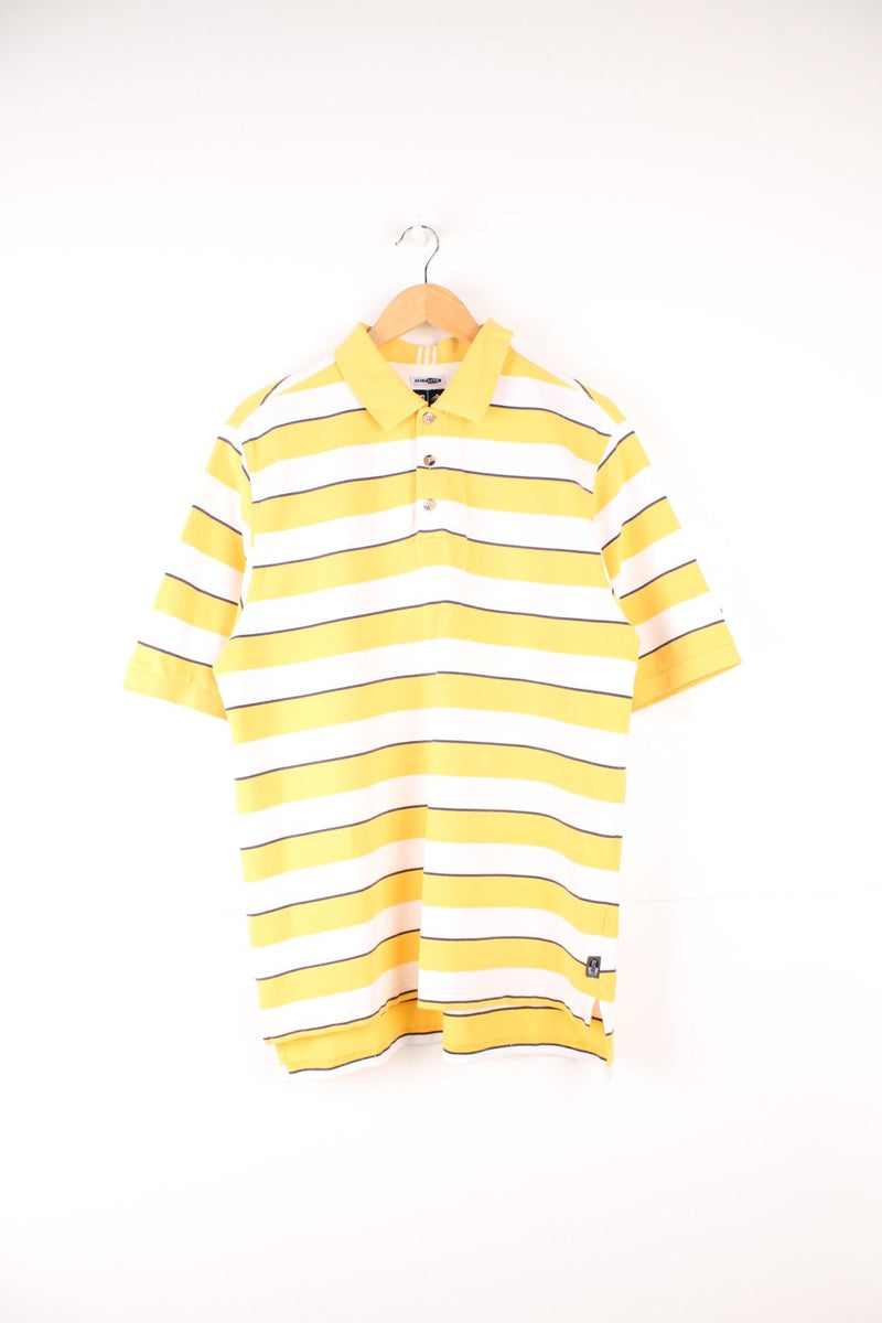 Adidas Climalite Polo Shirt in a yellow, black and white striped colourway, button up, and has logo embroidered on the left sleeve. 