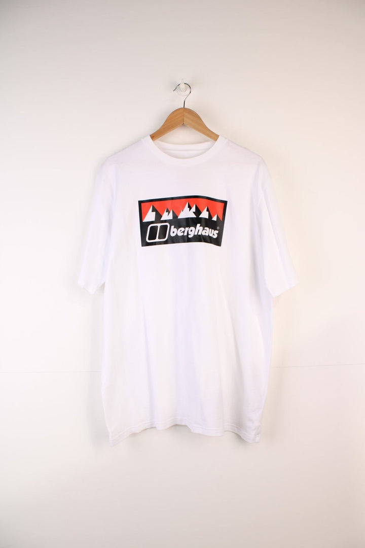 Berghaus T-Shirt in a white, black and red colourway, and has the logo printed across the front. 