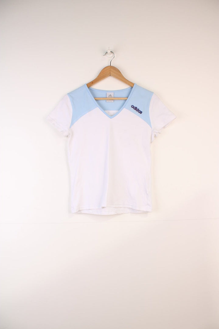 Adidas Top in a white and blue colourway, v neck, and has the logo embroidered on the front and back.