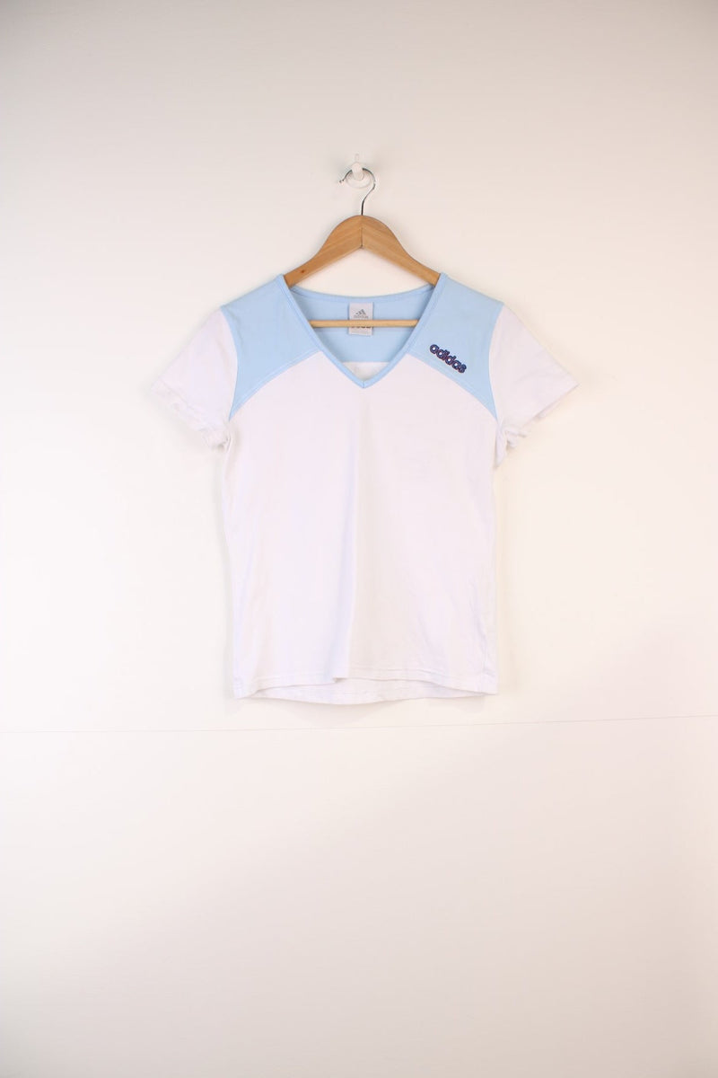 Adidas Top in a white and blue colourway, v neck, and has the logo embroidered on the front and back.