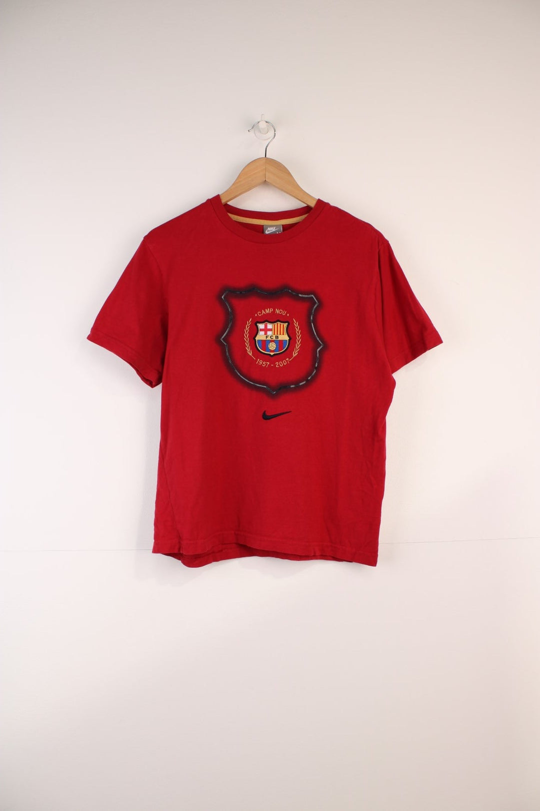 Nike Barcelona Football Team T-shirt in a red colourway, with the logos embroiderd on the front. 