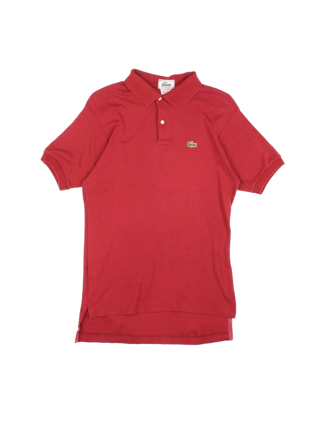 Vintage Lacoste by Izod Polo Shirt in a red colourway with button up collar and the logo embroidered on the front.