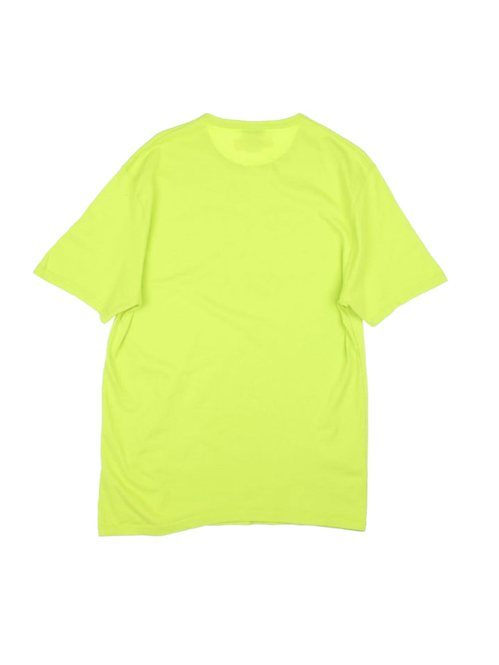 Champion Knuckles T-Shirt in a lime green colourway with the spell out logo in knuckles graphic printed across the front.