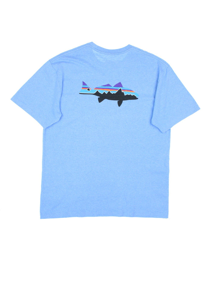 Patagonia Fitz Roy Fish T-Shirt in a blue colourway with the logo printed on the front and fish on the back.