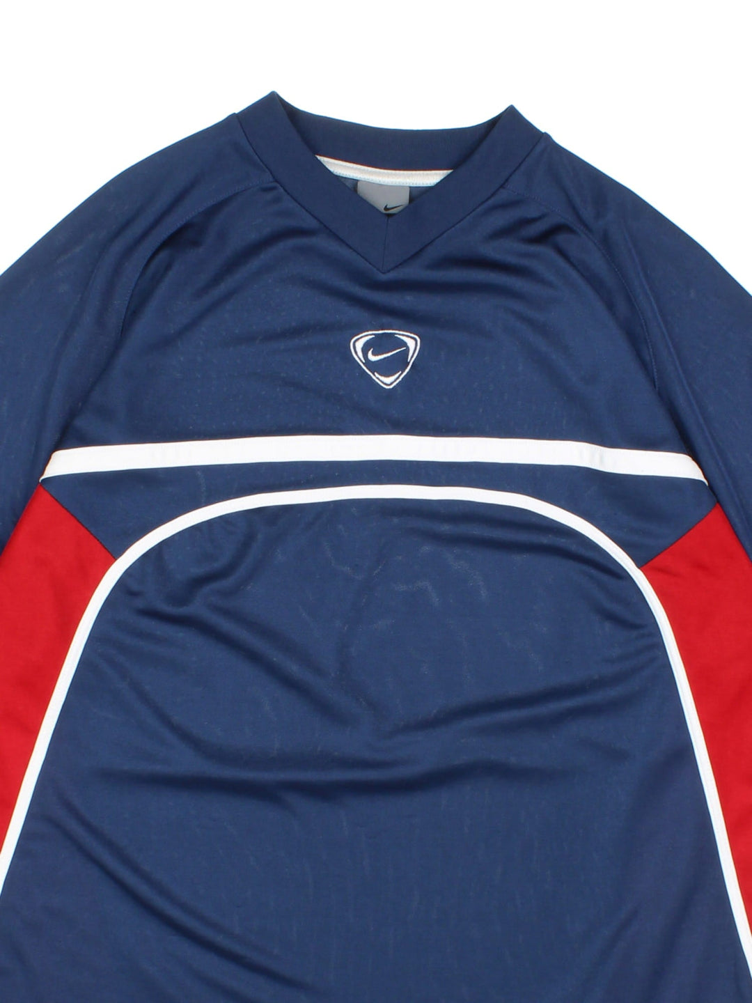 Vintage Y2K Nike Training Top in a blue, red and white colourway with the swoosh logo embroidered on the front and back.