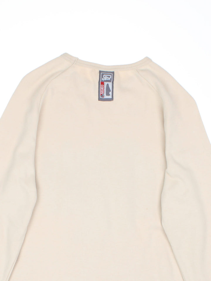 Y2K Nike Cortez Longsleeve T-Shirt in a tan colourway with the logo and graphic printed on the front.