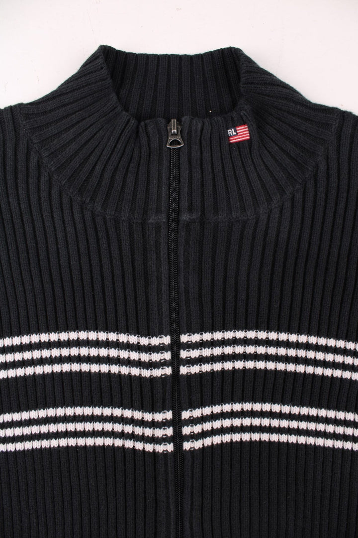 Ralph Lauren zip-through cardigan in black with white stripe detailing and a small embroidered 'RL' U.S. flag logo embroidered at the collar.