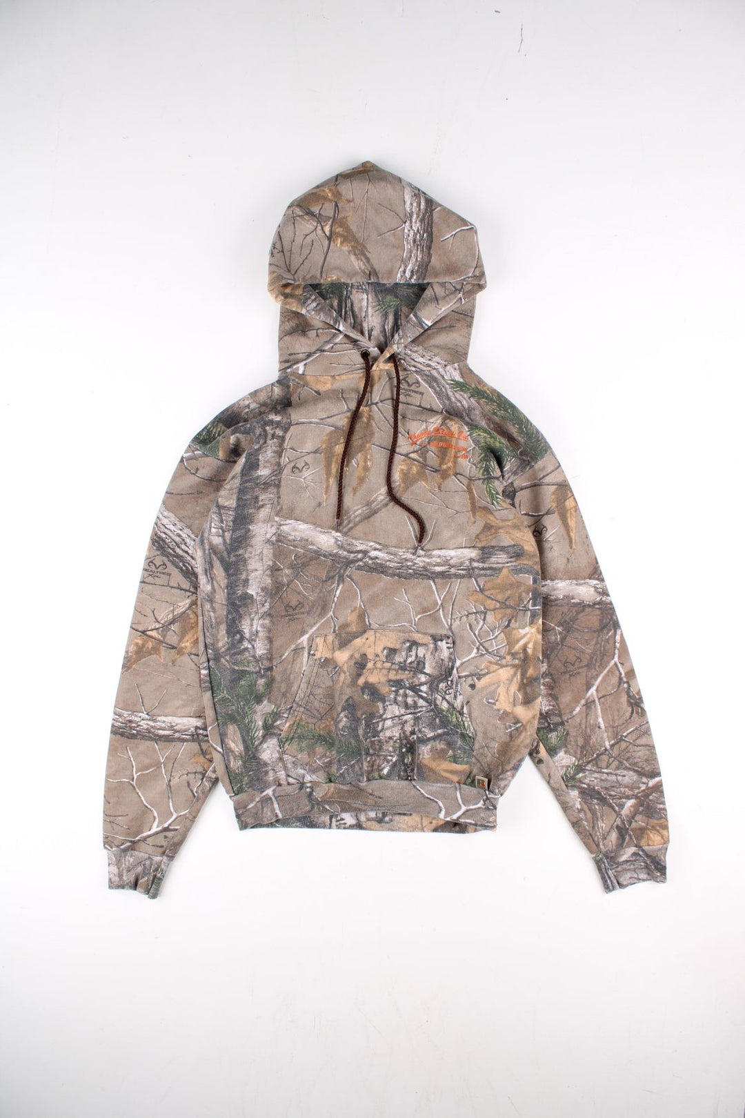 Vintage Russell Athletic Realtree Camo Hoodie in a brown colourway. Small logo on the front with classic pocket and large text graphic on the back. 