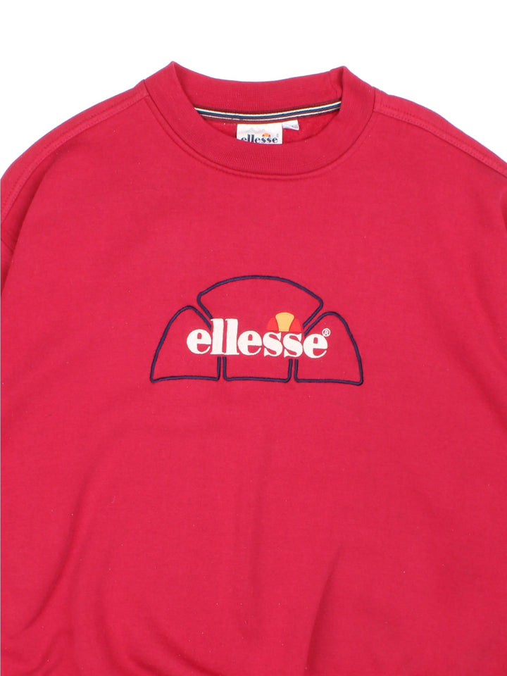 Vintage Y2K Ellesse Sweatshirt in a red colourway with a large logo embroidered on the centre front, and a small logo on the back collar. 