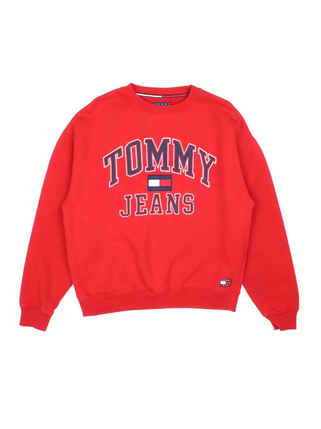 Tommy Hilfiger Tommy Jeans sweatshirt in a red colourway with a large logo embroidered on the front and a small patch stitched on the hem.