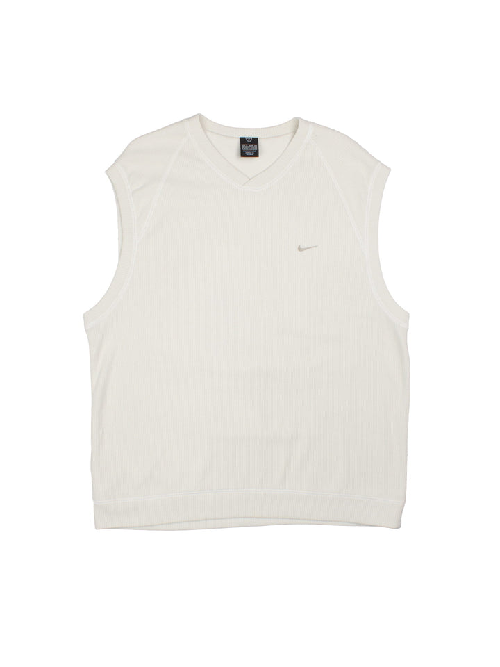 Vintage Nike golf sweater vest in a white colourway with a small nike logo embroidered on the chest. 